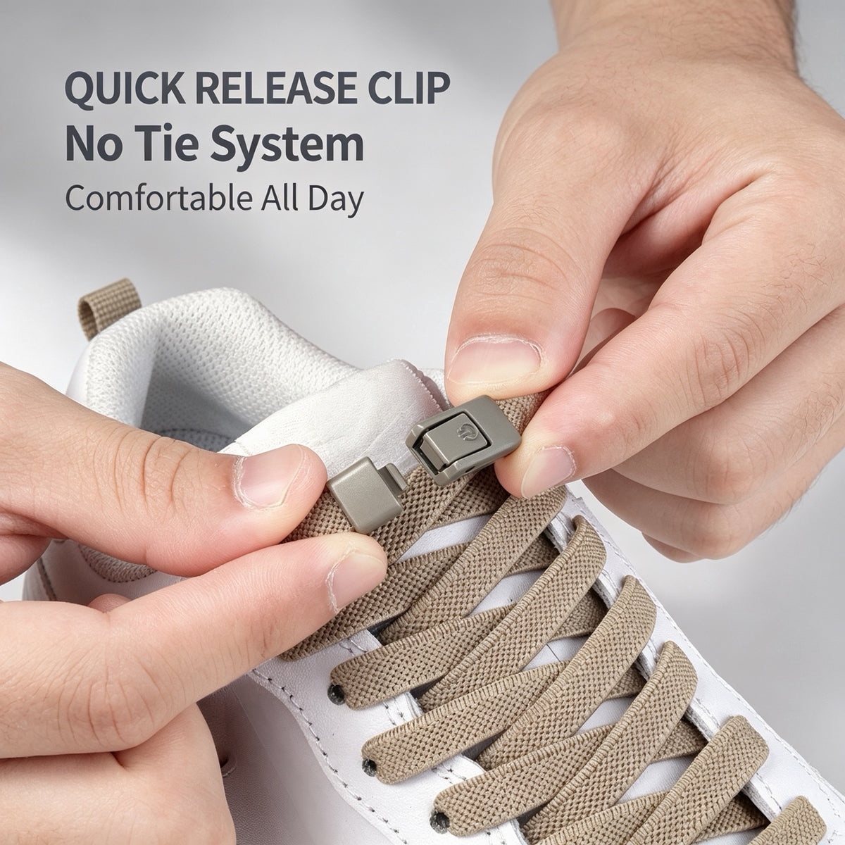 Close-up of beige elastic shoelaces with quick-release buckle on a sneaker


