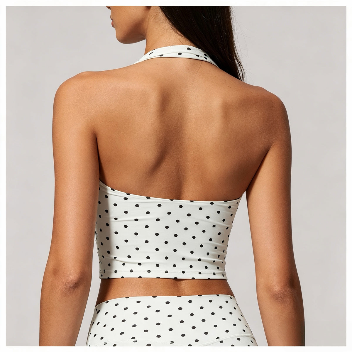 White polka dot halter sports bra back view with open back

