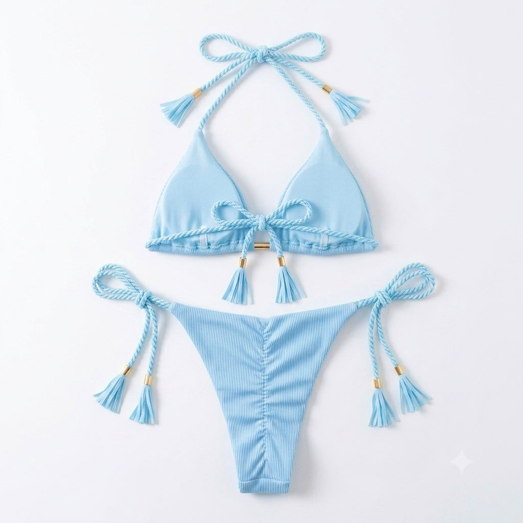 Back of blue ribbed bikini set showing rope ties, tassels and ruched bottoms

