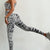 Zebra Printed Activewear Set with Padded One Shoulder Top and Ruching Pants